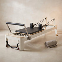 Pilates Reformer Foldable, Suitable for Intermediate and Beginners Users, Pilates Equipment for Home Gym Studio Use with 4 Adjustable Resistance Spring, up to 400 LBS — Studio Shot