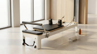 Pilates Reformer Foldable, Suitable for Intermediate and Beginners Users, Pilates Equipment for Home Gym Studio Use with 4 Adjustable Resistance Spring, up to 400 LBS — Lifestyle